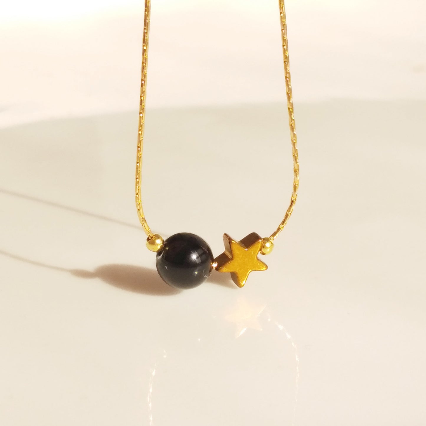 Collier en cristal d’étoile de boule d’onyx - Nicte