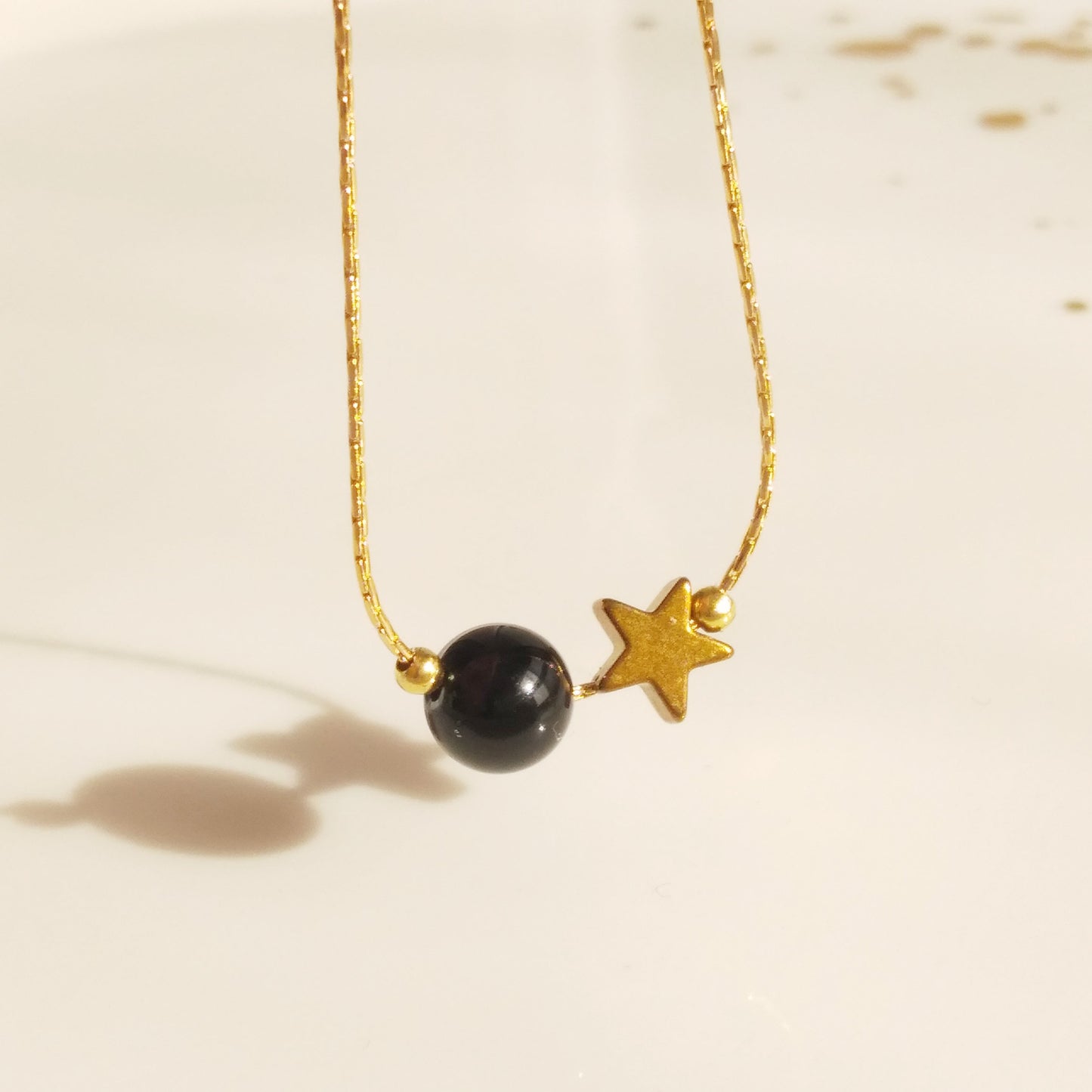 Collier en cristal d’étoile de boule d’onyx - Nicte